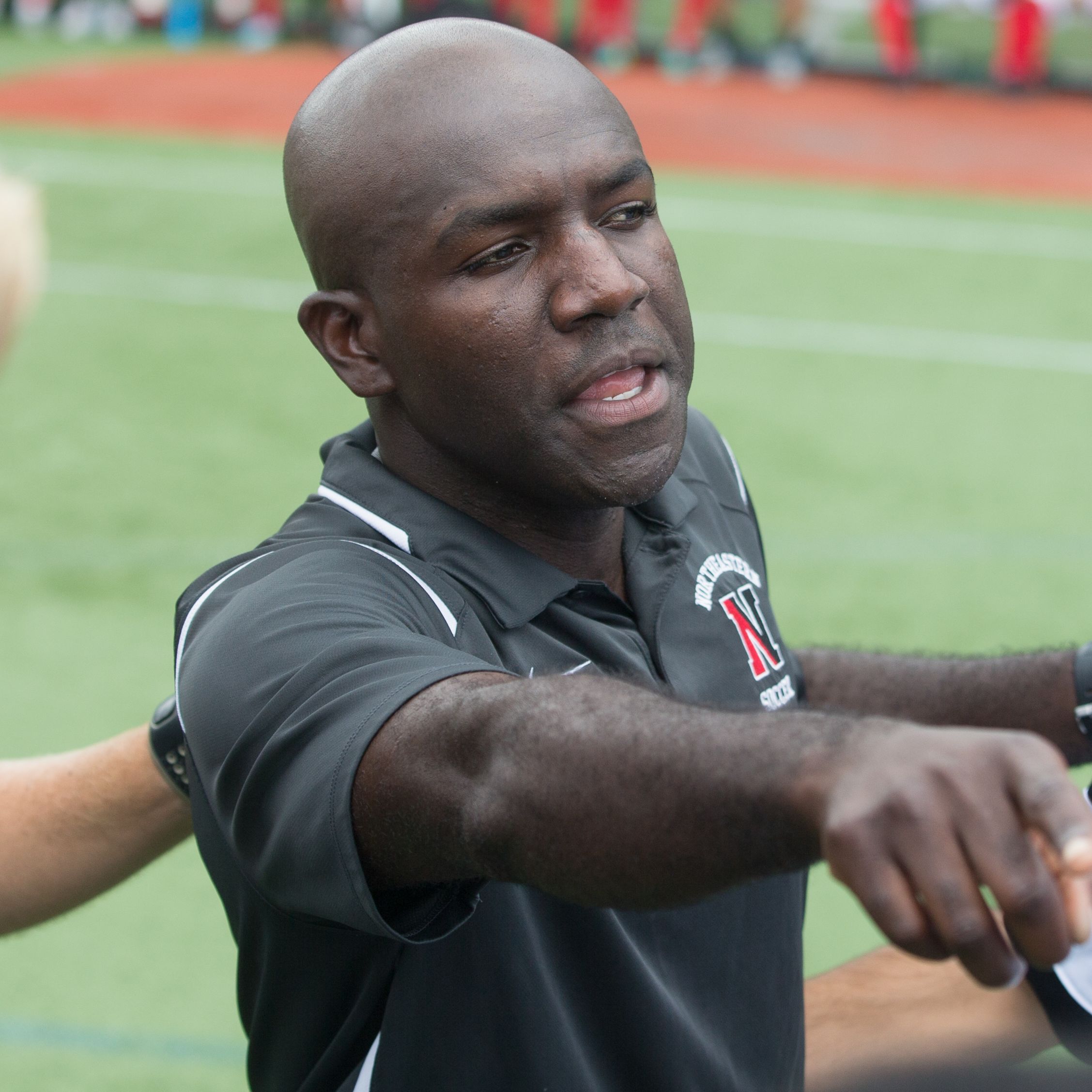Northeastern head coach Chris Gbandi