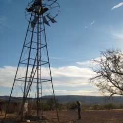 A windmill is squeaking alone in the desert (USA, Arizona)