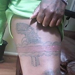 WHO DID YOUR TATTOOS---