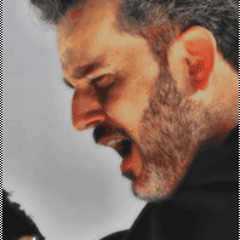 حُسينٌ بالعَرى دَامِيْ