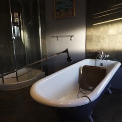 Bath room drum re-amp using a Genelec speaker and U89 Microphone.