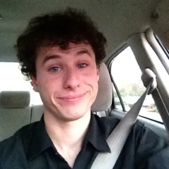 Max yells at the radio while stuck in traffic on Thursday at Pico and Lapeer