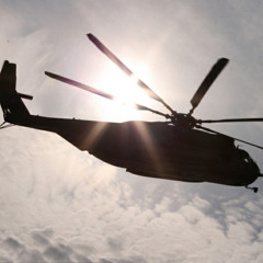 Binaural recording of an helicopter flying over beach