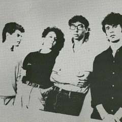 Otis Reding siting on the doc of the bay