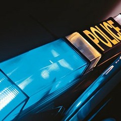 A police siren in my hood