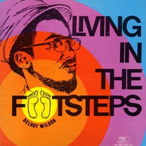 Stream Delroy Wilson - Living In The Footsteps by Comariano
