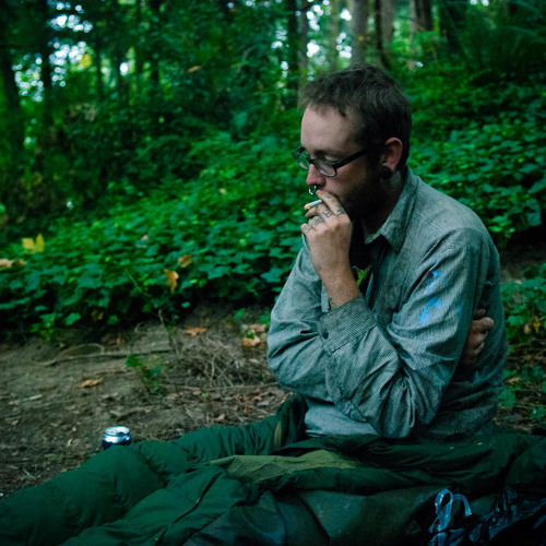 Puke smokes a cigarette in a park in oregon in the morning. Photo by Jeff Emtman Puke smokes a cigarette in a park in oregon in the morning. Photo by Jeff Emtman