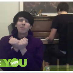 Dan playing piano and Phil meowing