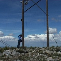 Electricity going trough a post (Mexico, Real de Catorce SLP)