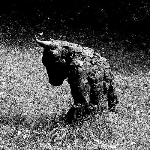 In flight from Knossos (its teeming streets labyrinthine) the Minotaur sings a great lament.