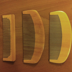 wood comb by 3 tape loops.