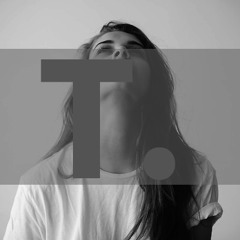 T.