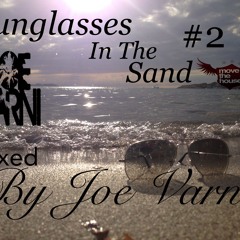 Sunglasses In The Sand - by Joe Varni