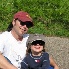 A Man Stands In The Mirror