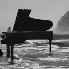 Piano At The Beach In The Rain