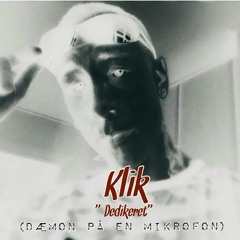 Dedikeret  (Dæmon På En Mikrofon)