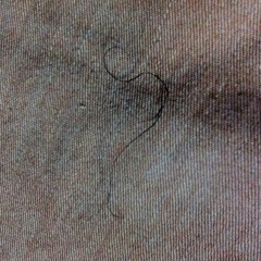 The story of the mysterious curly hair..