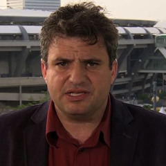 Dave Zirin on the World Cup You Won't See on TV: Protests, Tear Gas, Displaced Favela Residents