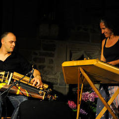 Gregory Jolivet (hurdy gurdy) & Christie Burns (hammered dulcimer)