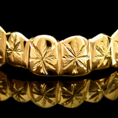 Gold Tooth Grin
