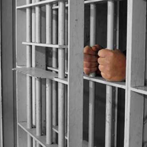 أسير في غياهبهم أسير