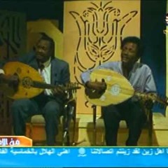 زيدان ابراهيم و عمر الشاعر وسط الزهور متصور