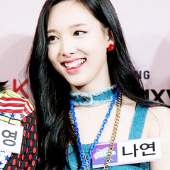 Im Nayeon (나연) of Sixteen - Santa Tell Me (by Ariana Grande)