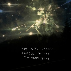 she sits crying cradled in the mountain tops