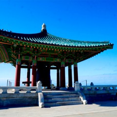 Sept 17, Angel Gates Park, tourists imitate the sound of the Korean Bell of Friendship