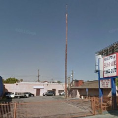 steel cable against flag pole