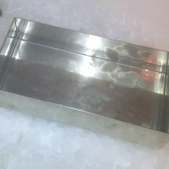 metal container on dry ice pellets