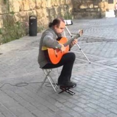 Flamenco Guitar Player and Horses at the Lion´s Gate, Sevilla