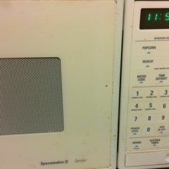 Spacemaker II Microwave Sitting Idle