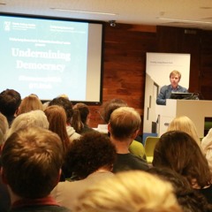Behind the Headlines | Undermining Democracy