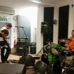 A guy with a guitar and a smartphone