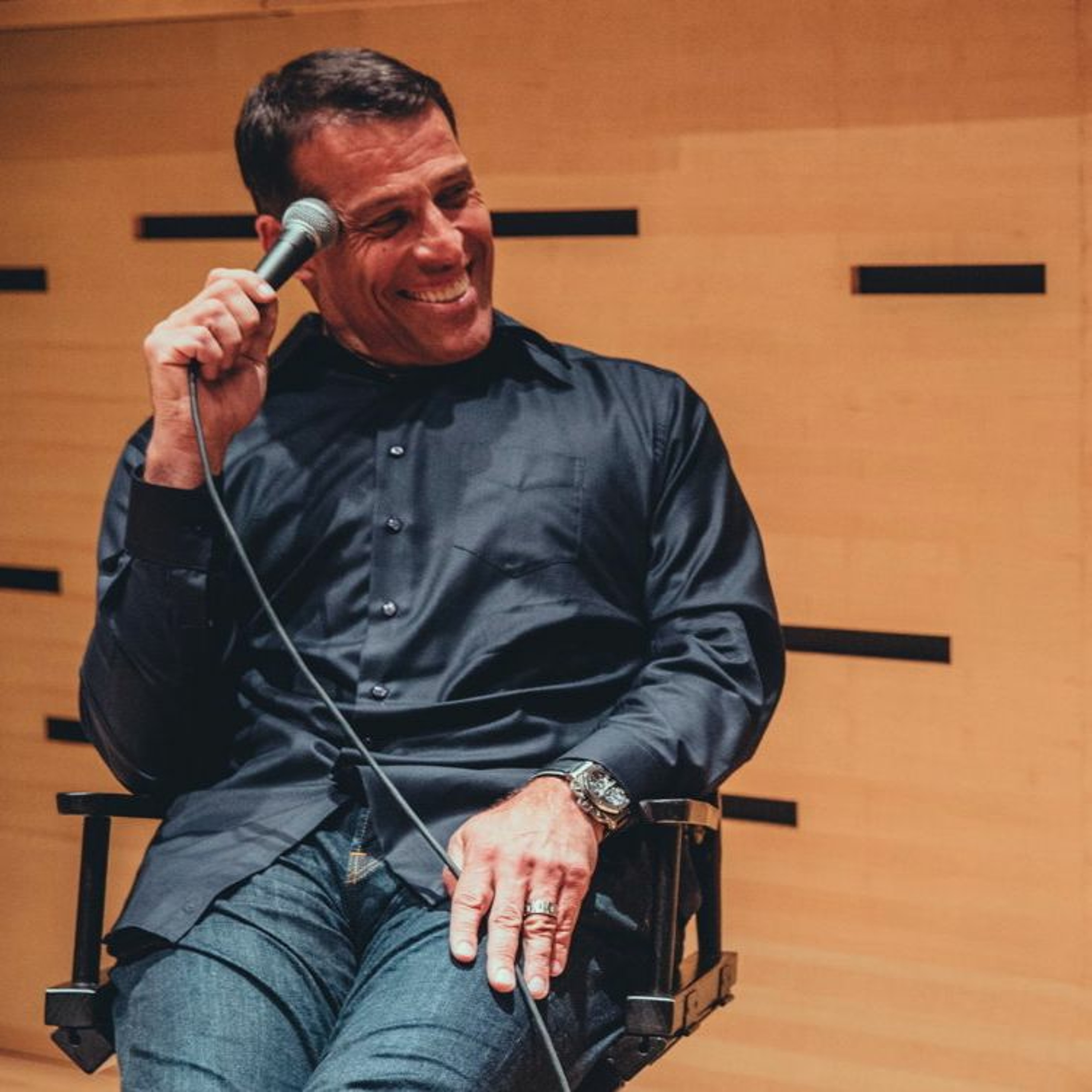 cover of episode #99 - Tony Robbins + Joe Berlinger