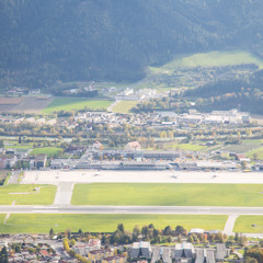 Plane taking off above Innsbruck