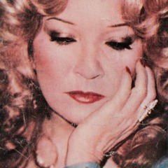 تبتسم لي عينيك الحلوة - شادية