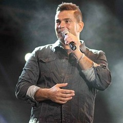 Amr Diab - Kan Bayen Min Salamha عمرو دياب - كان باين من سلامها