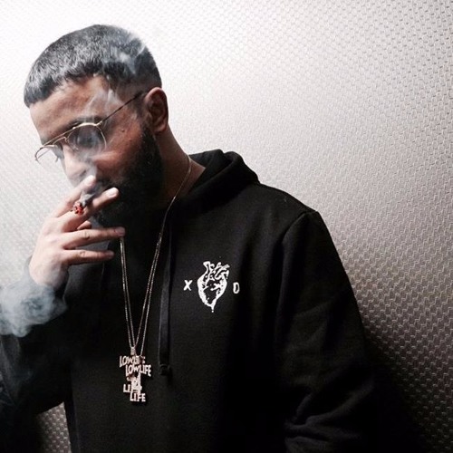 Nav smoking a cigarette (or weed)
