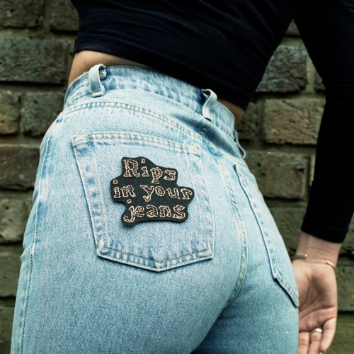 rips on back of jeans
