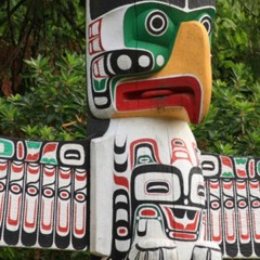 In front of the totem!