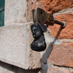 Standing in a corner at campo Santo Stefano, bells, people