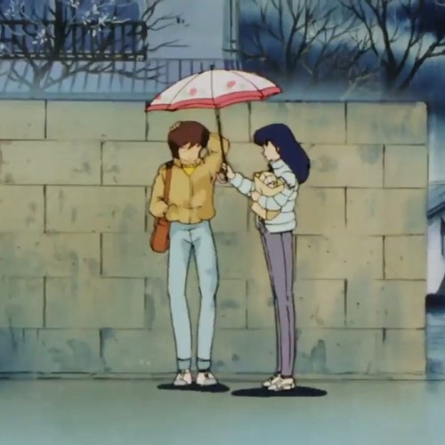 sharing an umbrella
