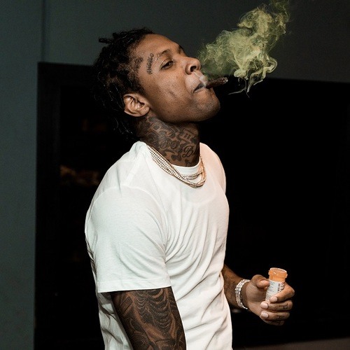 Lil Durk smoking a cigarette (or weed)
