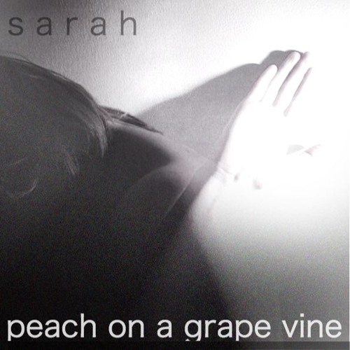 peach on a grape vine