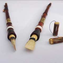 Testing a Louvre aulos by Robin Howell