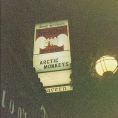 arctic monkeys played through a vintage radio in the rain