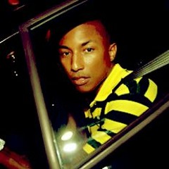 Pharrell Drives Away In His SUV