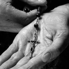 Crucifix Held Close Metal Cover